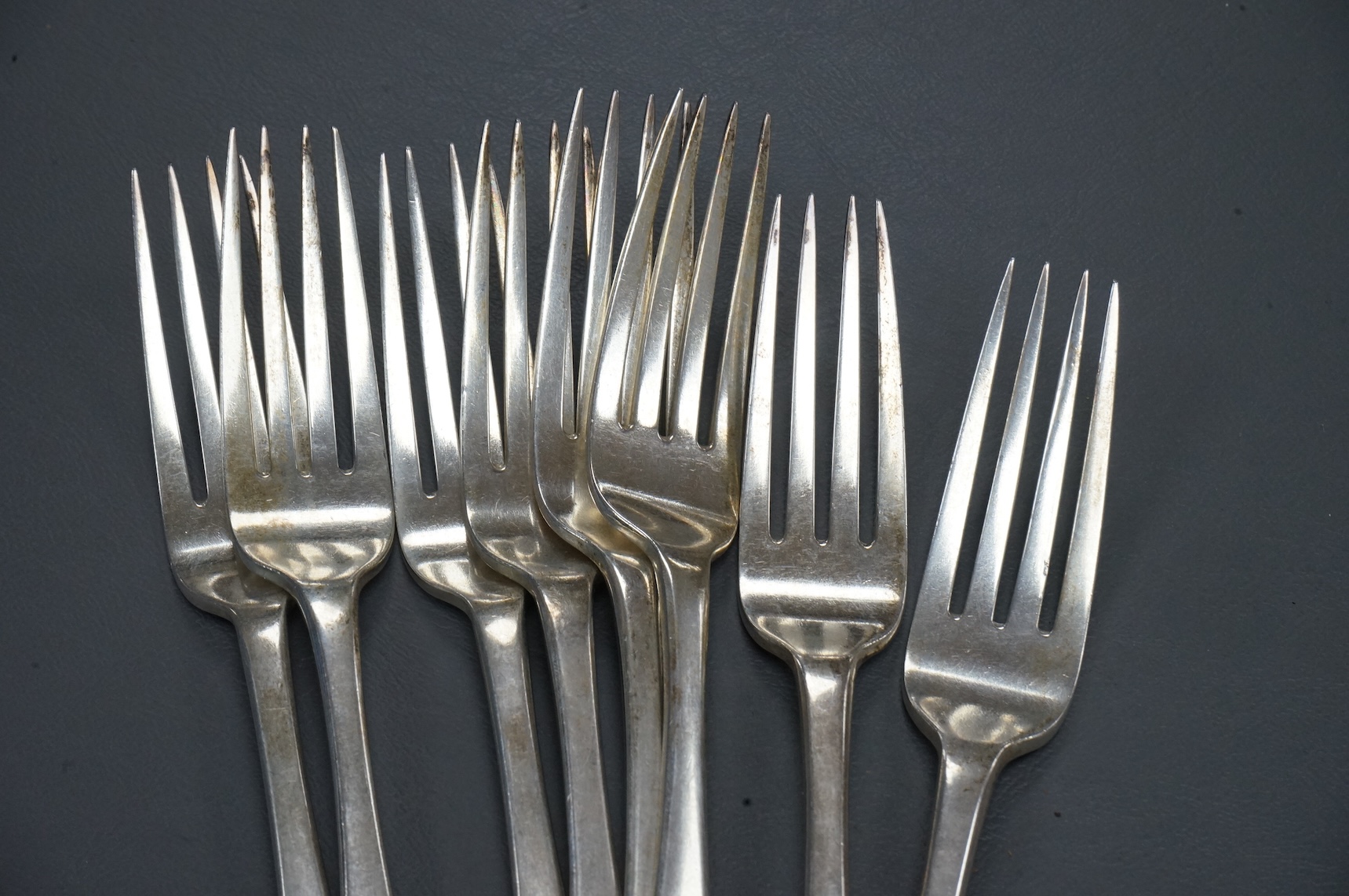 A set of eight William IV provincial silver Hanoverian pattern table forks, by Thomas Wheatley, Newcastle, 1830, 20.6cm, 16.7oz.